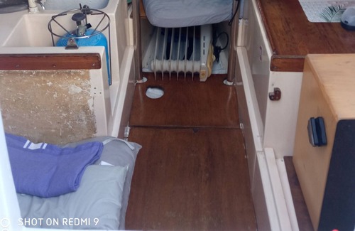 Le Lavandou Boat Rental | Small sailboat at dock