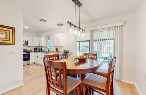 Palm Bay House | Snowbird-friendly home with open layout, enclosed yard, smart TV, AC, & W/D