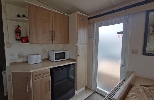 Llwyngwril Ski Chalet | Snowdonia Holiday Sea Beach and Mountains view