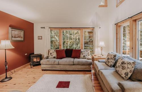 Glacier House | Snowline Cabin 34 - Great English Tudor-style home with hot tub Now with Wifi