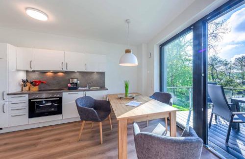 Krakow am See Apartment | Sonnengruß - Stilvolles Apartment mit Balkon, Kamin & Wellness-Flair am Krakower See