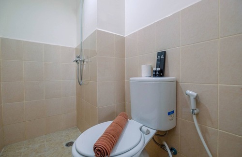 Pancawati Apartment | Sophisticated Studio Room At Podomoro Golf View Apartment By Travelio