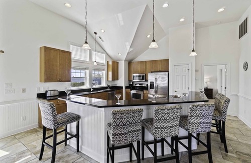 Wind Over Waves House | Soundside Dog Friendly w/Pool, Elevator, Hot Tub, Game and Theater Rooms