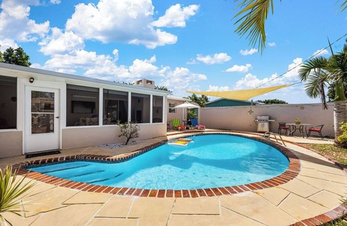 Tropic House | SpaceCoast Charm — 3BR Home. Heated Pool & Terrace