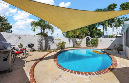 Tropic House | SpaceCoast Charm — 3BR Home. Heated Pool & Terrace