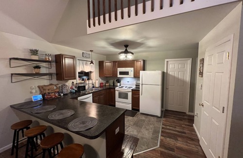 Locust Lake Village Ski Chalet | Spacious and cozy pet friendly chalet w/hot tub & garden sauna