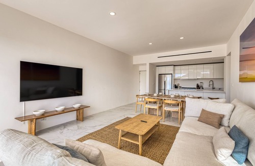 Ampliacion Juarez Apartment | Spacious condo with private washer/dryer, city views, and shared pool