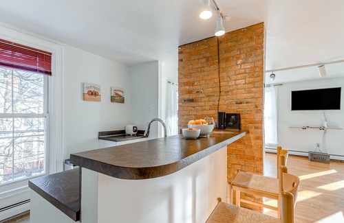West End Apartment | Spacious downtown apartment with historic charm, natural light, AC & W/D access