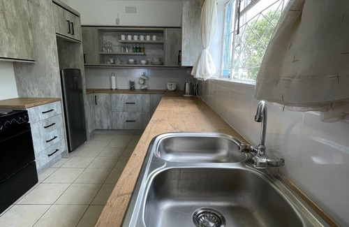 Bulawayo House | Spacious family home. A stroll away from a vibrant shopping centre & golf course