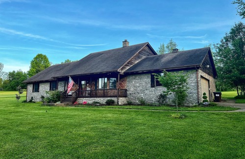 Keene House | Spacious family Lodge with solar heated pool, hot tub, fire pit and EV charger.