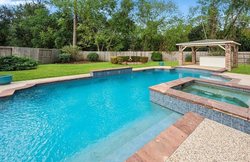 Louetta House | Spacious Mid Term Family Home with Heated pool And Hot Tub.