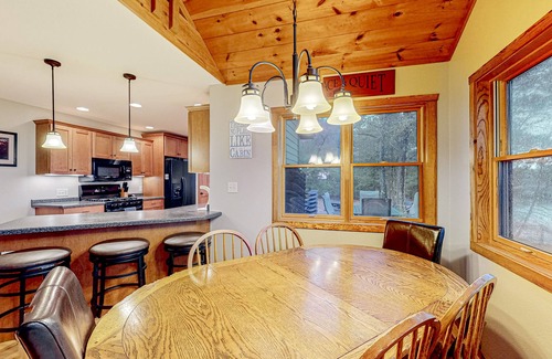 Manitowish Waters House | Spacious & peaceful lakefront villa & guest house with fire pit, patio, & views