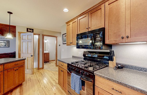 Manitowish Waters House | Spacious & peaceful lakefront villa & guest house with fire pit, patio, & views