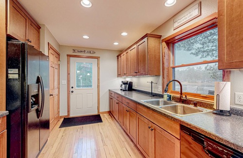 Manitowish Waters House | Spacious & peaceful lakefront villa & guest house with fire pit, patio, & views