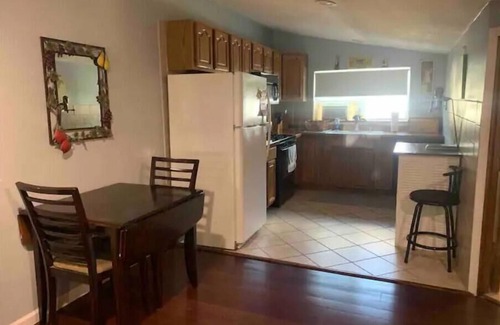 Oswego Apartment | Spacious Private 1br apt King Bed Queen Pullout Jacuzzi Smart TVs WiFi Kitchen