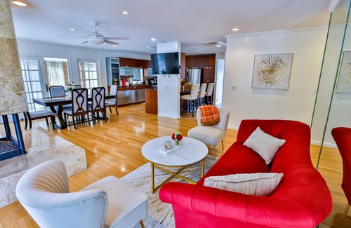 Orange House | Spacious vacation home with fireplace, yard and pool
