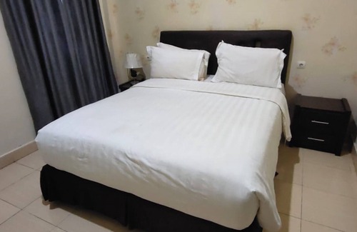 Banjarmasin Hotel | SPOT ON 92196 Kost Axcel