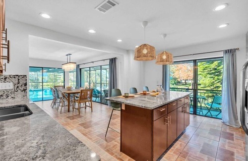 Palma Sola House | Sprawl Out & Relax in this Big Stylish Pool Home-Huge Patio- Near IMG & Beaches!