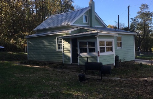 Tuscarora Cottage | Springs Store Cottage Entire Property king bed