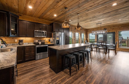 Chalet Village North Condo | Stacked Deck 3 Bedroom Cabin by RedAwning