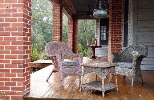 Brunson House | Stately 2-story historic home maintains original charm and charater.