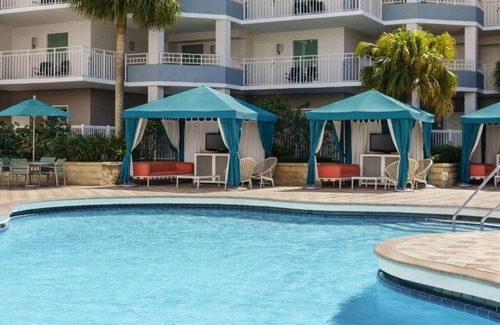 Florida Central Atlantic Coast Hotel | Stay Less Than 3 Miles From Disney w/Comfort, Style + Family Features l 3 Rooms