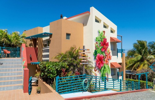Bajura Apartment | STAY LOVE PLAY at Fusion Beach Villas GARDEN studio, 1/2 mi west of Jobos Beach