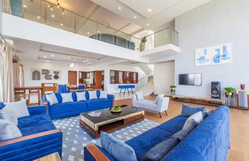 Kune Village Villa | StayVista's White Pebbles - A Villa with Theater Room & Swimming Pool