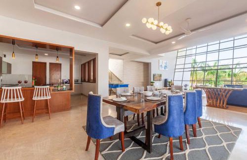 Kune Village Villa | StayVista's White Pebbles - A Villa with Theater Room & Swimming Pool