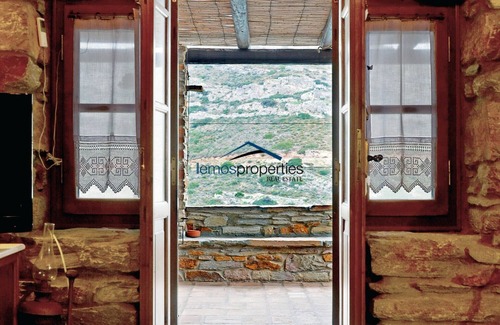 Kea Villa | Stone built waterfront villa with direct access to the sandy beach of Spathi,