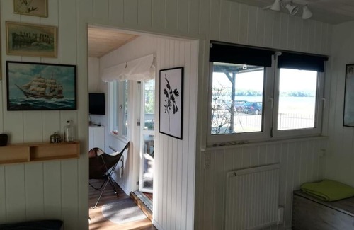 Broager Apartment | Strandlejlighed med havudsigt