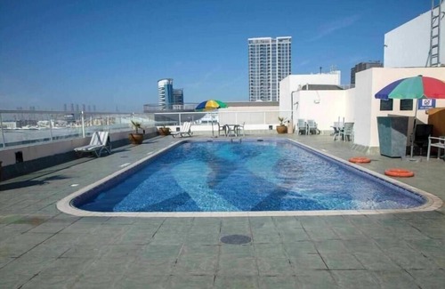 Al Mankhool House | Studio Apartment Near Manhattan Avenue By Luxury Bookings