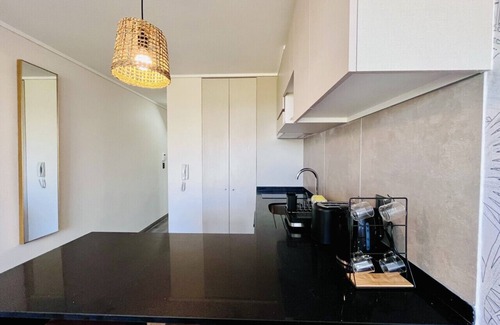 Nunoa Apartment | Studio Castillo Velasco - Gym Laundry Parking Pool Wifi