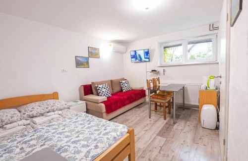 Ljubljana Apartment | Studio Southwest 2 semi-basement