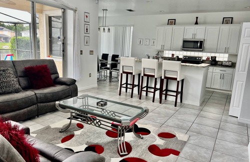 Sunset Lakes Villa | Stunning lakeside location 2 king masters , games room, hot tub 4 miles Disney.