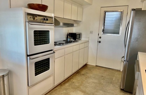 Canyon Corridor Condo | Stunning light-filled Mid-Century Mod Condo in iconic Canyon View Estates.