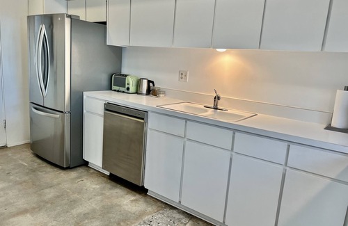 Canyon Corridor Condo | Stunning light-filled Mid-Century Mod Condo in iconic Canyon View Estates.