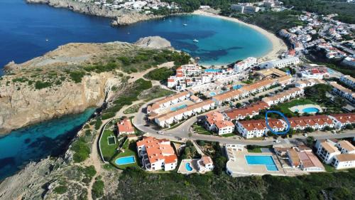 Arenal d'en Castell Apartment | Stunning sea views apartment, pool, 5 min walk to beach, Winner of 2025 Travellers Choice award