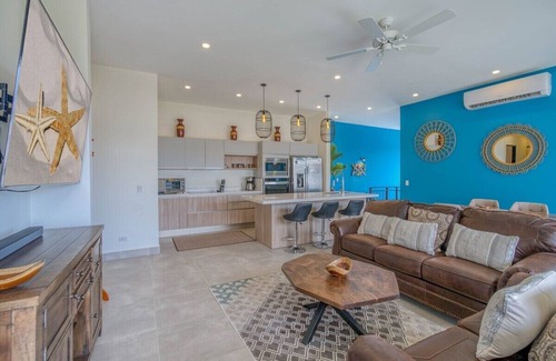 Coco House | Stylish 2-Level Villa | Ocean Views + Club Access