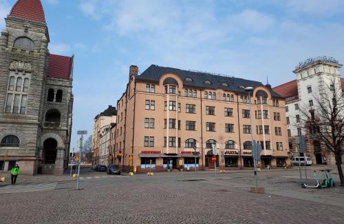 Kluuvi Apartment | Stylish city home with stunning views 76 m2