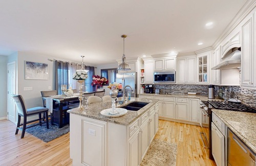 Westbrook Condo | Stylish condo with a high-end kitchen, washer/dryer, & large yard