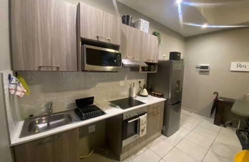Parkwood Condo | Stylish Dante’s 1-bedroom condo free Wifi & Cinema