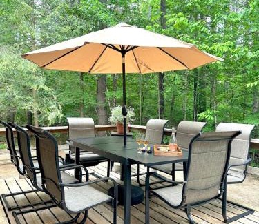 North Creek Ski Chalet | Stylish Forest Lodge with Large Hot Tub, Firepit and Fireplace minutes to Gore Mountain