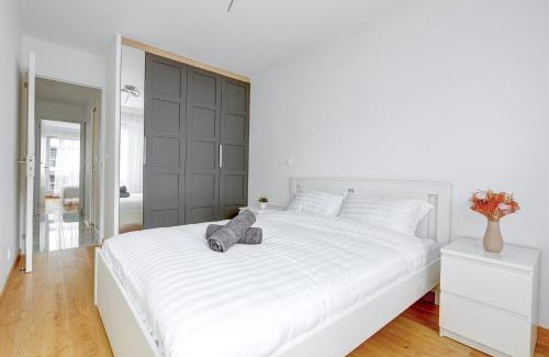 Flandres Apartment | Suite au Cœur de Paris, Architecturale et Élégante