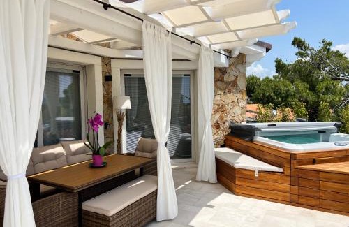 Porto Pino Apartment | Suite Villa Aquamarina con Jacuzzi Riservata