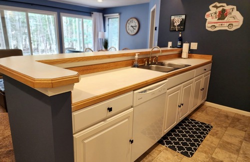 Bellaire Condo | Summer fun Northern Michigan! 2 bedroom, 2 bath. Pool and private beach access