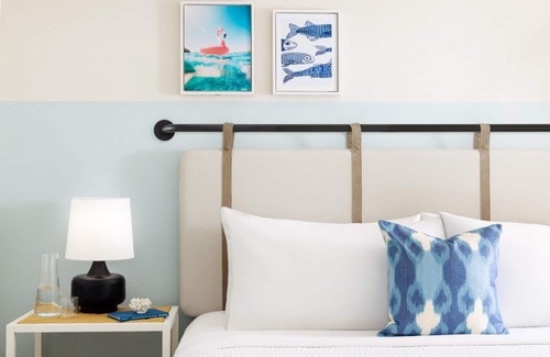 New Town Hotel | Sun, Sip, & Socialize | Island Stay w/2 Pools & Backyard Bash