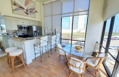 South Padre Island House | Sunchase Loft 20 ft glass view 4-min to water