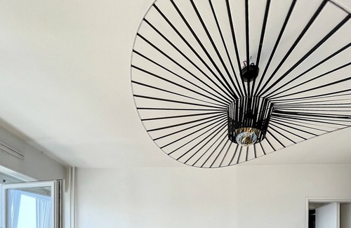 Quartier du Pont-de-Flandre Apartment | Sunny Apartment With View