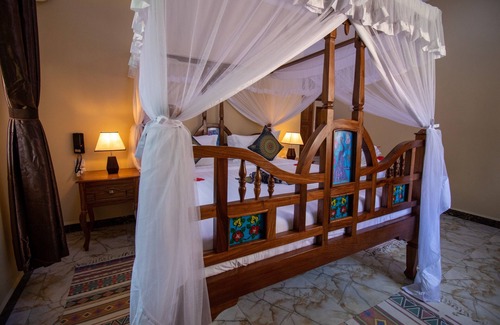 Uroa Resort | Sunny Palms Beach Bungalows
